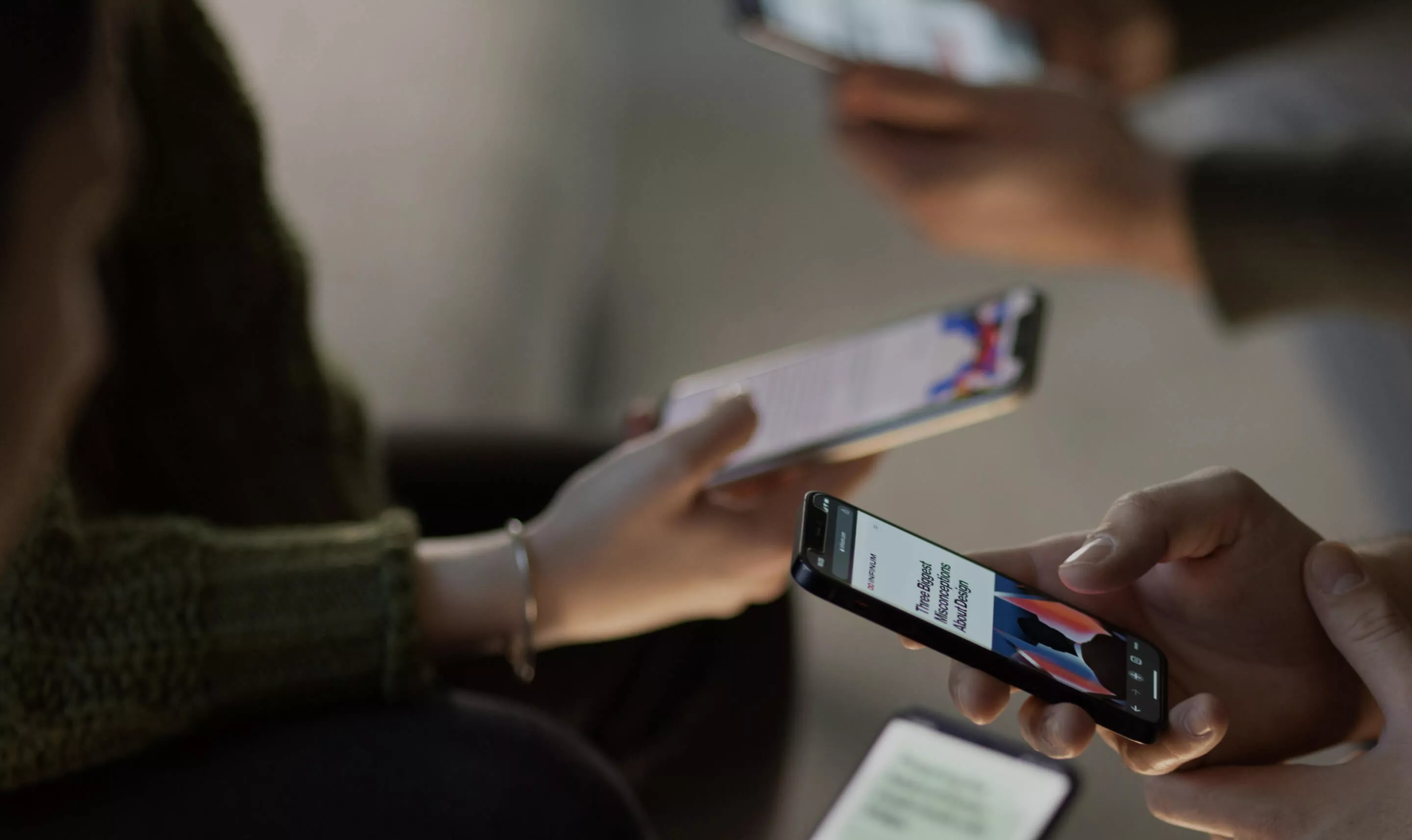 Infinum developers testing UI UX design services on their phones